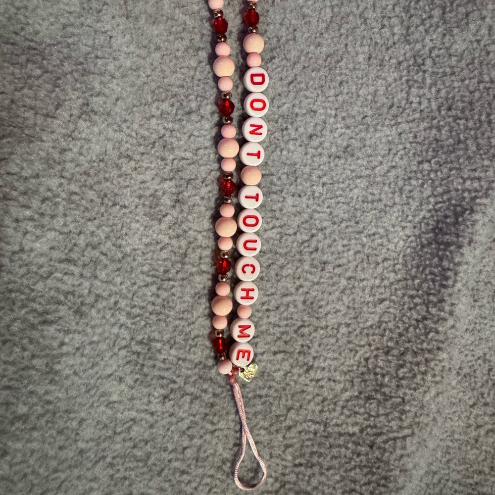 Velvet caviar phone charm